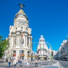 People crossing Gran Via in Madrid